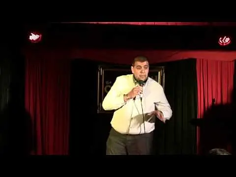 Fat man makes a fool of himself on stage...