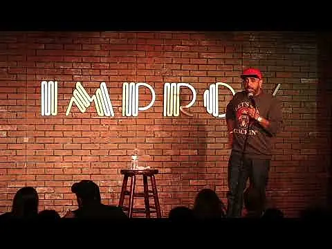 Derrick Jack performing live at Addison Improv