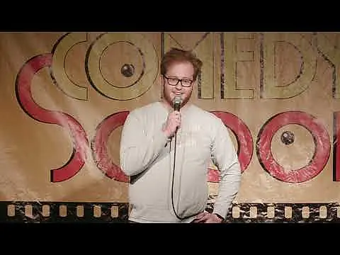 Luc does standup comedy for the 10th time at backyard comedy club